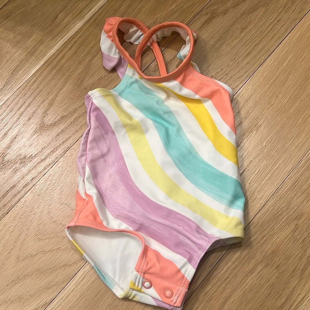 Carters pastel rainbow swimsuit never worn before size 6months